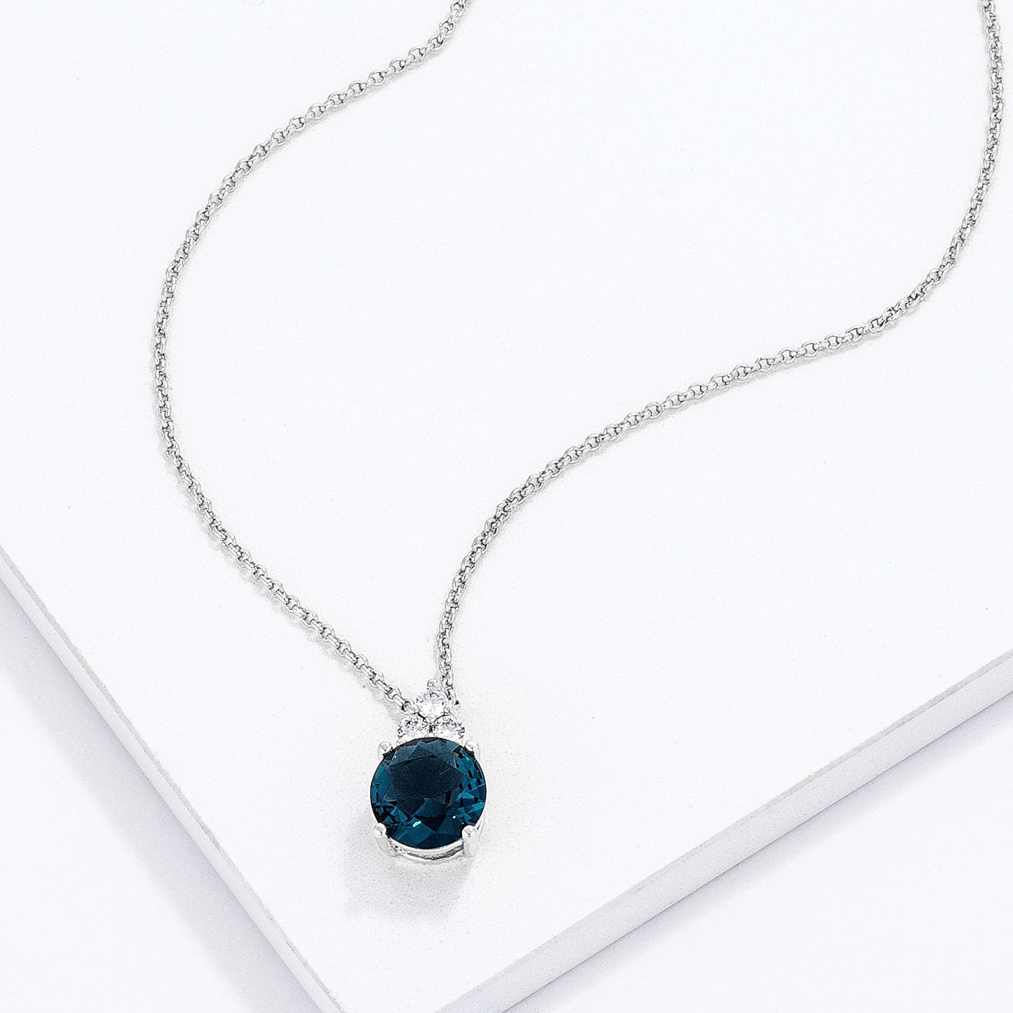 Simple Rhodium Plated 9mm Teal CZ Pendant