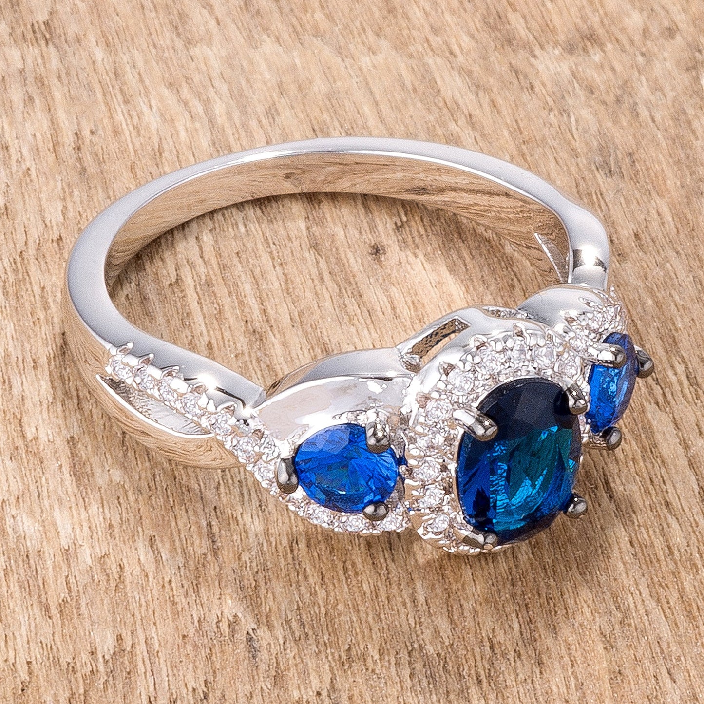1.43Ct Rhodium & Hematite Plated Sapphire Blue & Clear CZ Three Stone Twisted Ring